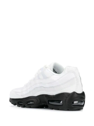 Shop Nike Contrast Sole Sneakers In White