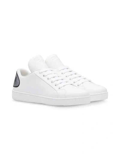 Shop Prada Comics Leather Sneakers In White