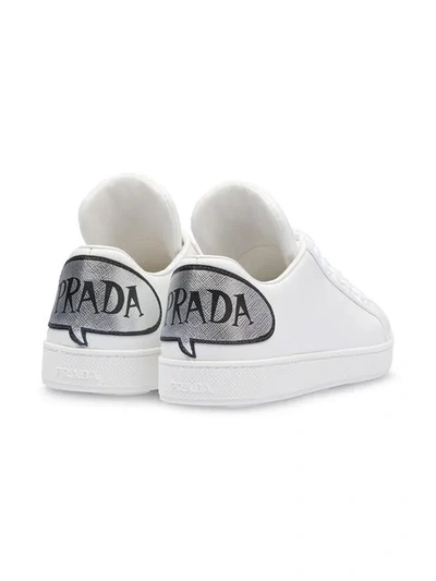 Shop Prada Comics Leather Sneakers In White
