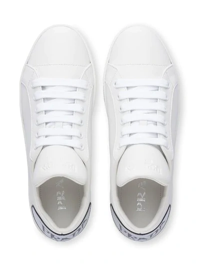 Shop Prada Comics Leather Sneakers In White