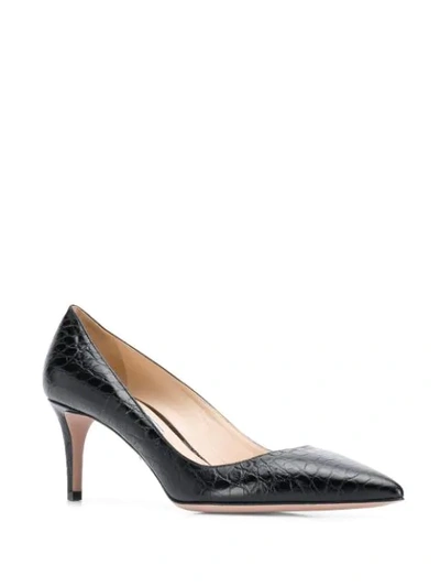 Shop Prada Textured Leather Pumps In F0002