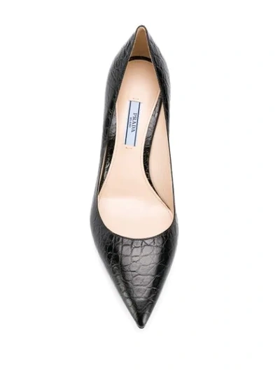 Shop Prada Textured Leather Pumps In F0002