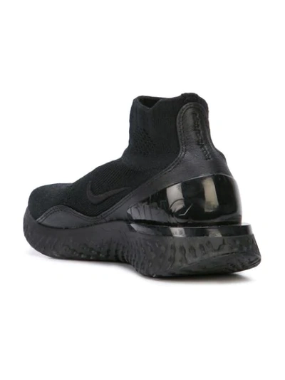 Shop Nike Rise React Flyknit Sneakers In Black