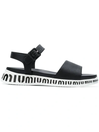 Shop Miu Miu Flat Logo Sole Sandals In F0002 Black
