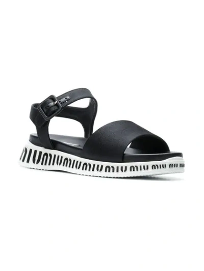 Shop Miu Miu Flat Logo Sole Sandals In F0002 Black