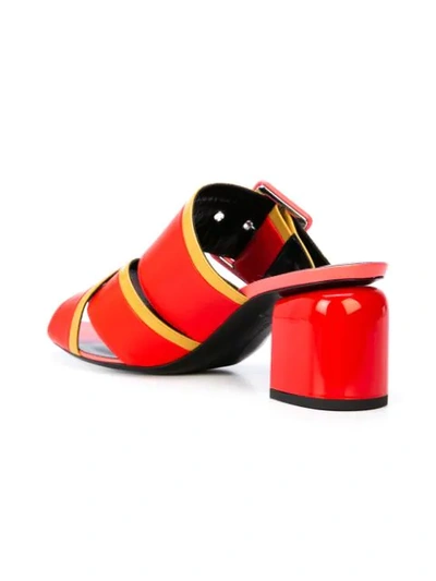 Shop Pierre Hardy Buckled Mules In Red