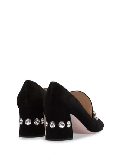 Shop Miu Miu Crystal Embellished Pumps In F0002 Black