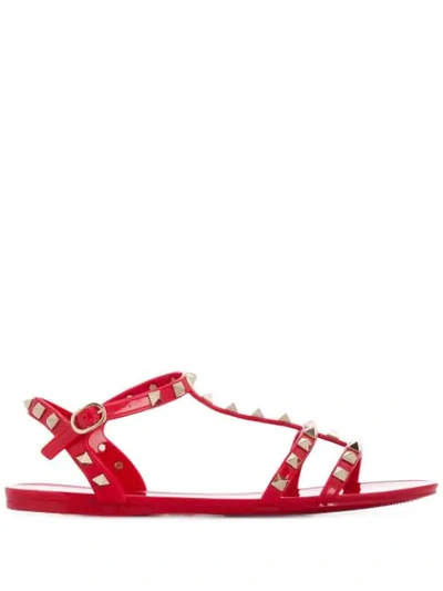 Shop Valentino Rockstud Flat Sandals In Red