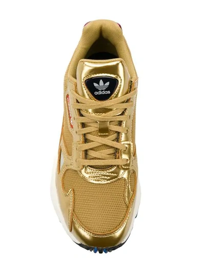 Shop Adidas Originals Falcon Sneakers In Gold