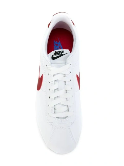 Shop Nike Classic Cortez Sneakers In White