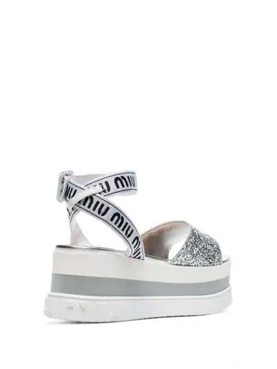 Shop Miu Miu White 75 Glitter Embellished Logo Strap Leather Flatform Sandals In Silver