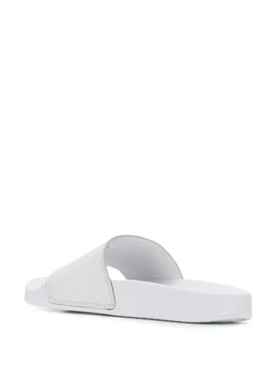 Shop Axel Arigato Bird Embroidered Sliders In White