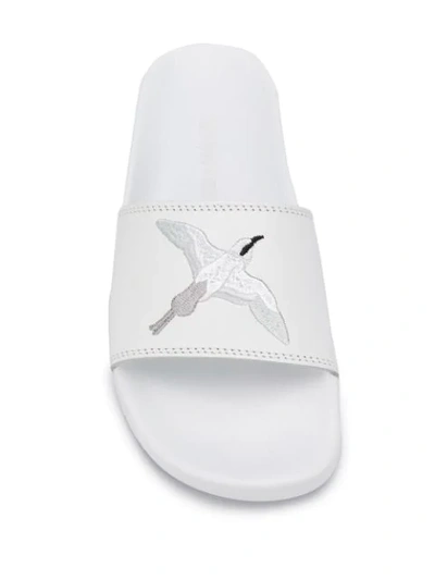 Shop Axel Arigato Bird Embroidered Sliders In White