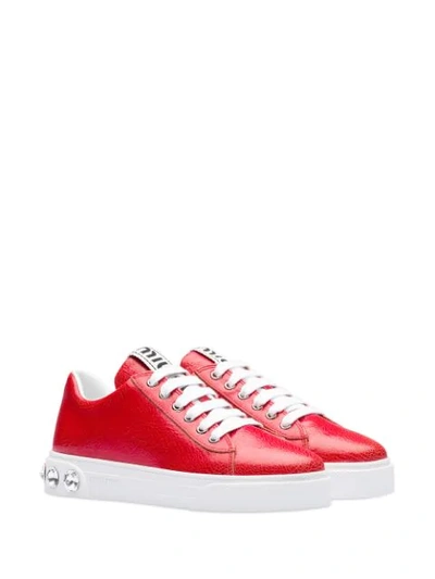 Shop Miu Miu Crystal Studded Low Sneakers In Red