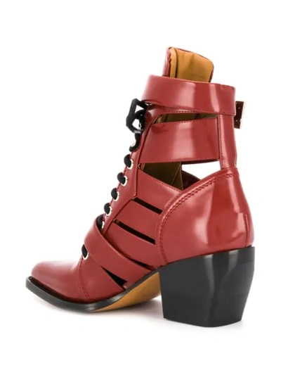 Shop Chloé Cut Out Buckle Boots In Red
