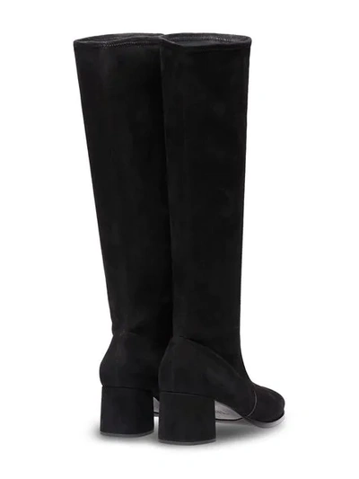 Shop Prada Stretch Suede Boots In Black
