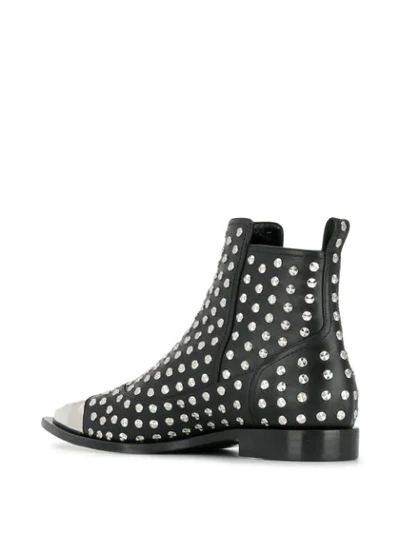 Shop Alexander Mcqueen Studded Ankle Boots In Black