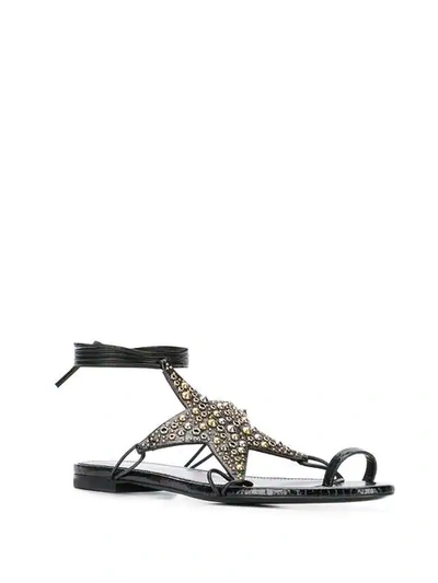 Shop Saint Laurent Embellished Star Sandals In Black