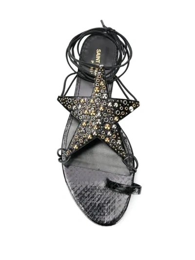 Shop Saint Laurent Embellished Star Sandals In Black