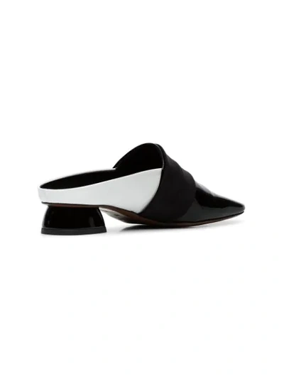 black and white Zygo 15 patent leather flat loafers