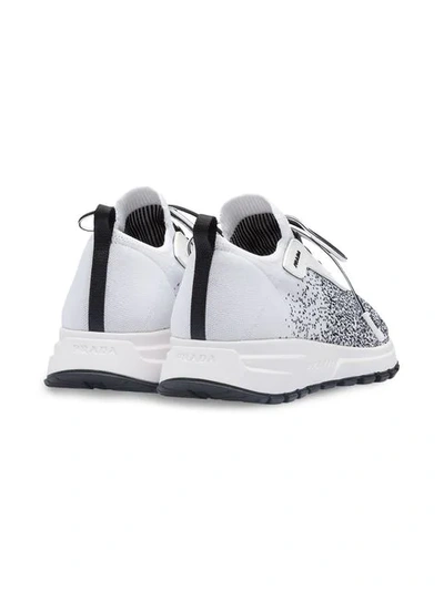 Shop Prada Knitted Lace-up Sneakers In White ,black