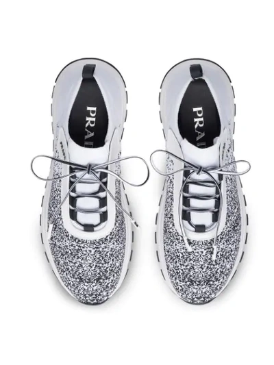 Shop Prada Knitted Lace-up Sneakers In White ,black