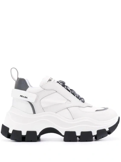 Shop Prada Pegasus Sneakers In White