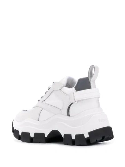 Shop Prada Pegasus Sneakers In White