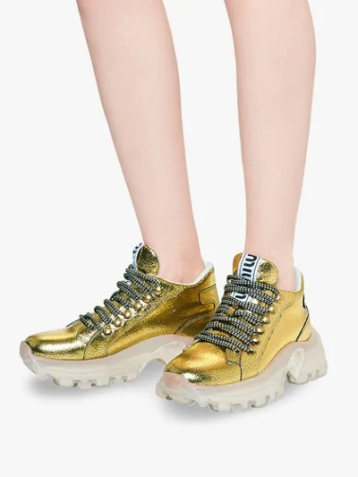 Shop Miu Miu Metallic Leather Sneakers - Gold