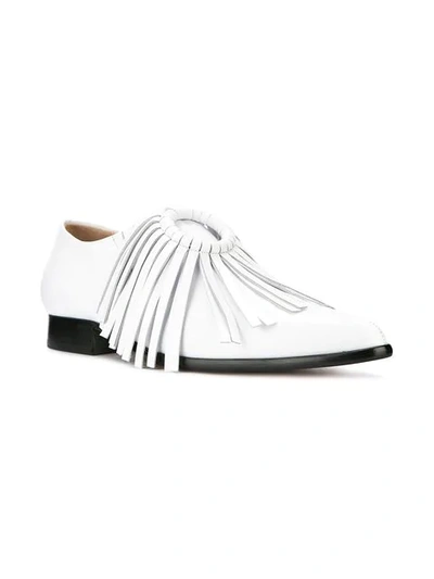 pointed fringed loafers