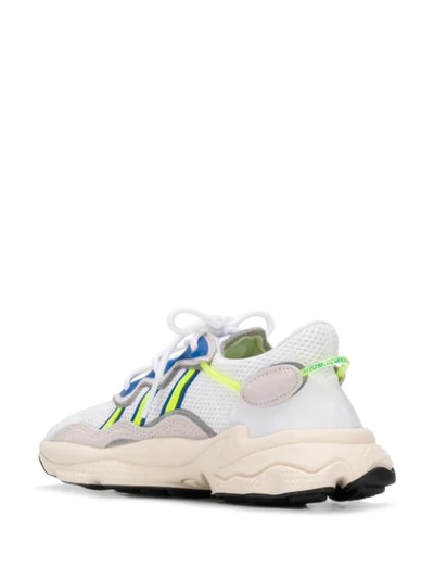 Shop Adidas Originals Adidas Ozweego Low Top Sneakers - White