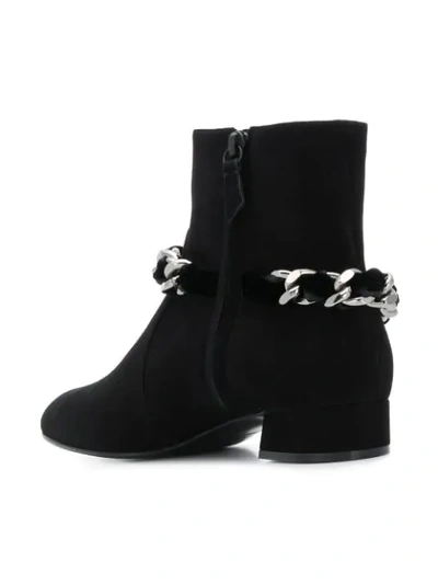 chain embellished boots