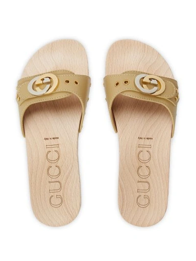 Shop Gucci Leather Slide Sandal With Interlocking G In Neutrals