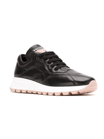 Shop Prada Prax 01 Leather Sneakers In Black