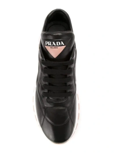 Shop Prada Prax 01 Leather Sneakers In Black