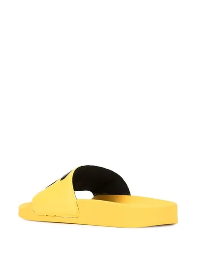Shop Msgm Logo Print Slide Sandals In Yellow