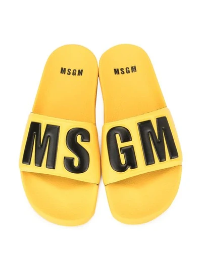 Shop Msgm Logo Print Slide Sandals In Yellow