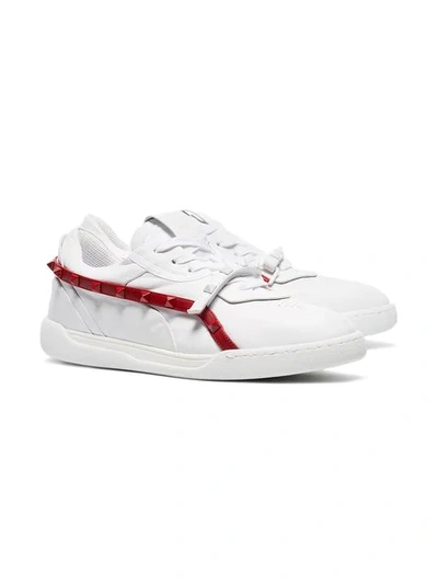 Shop Valentino Rockstud Armour Studded Leather Sneakers In White