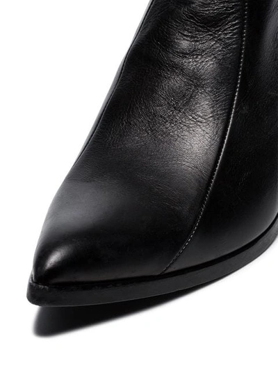 Shop Saint Laurent Black Finn 60 Leather Cowboy Ankle Boots