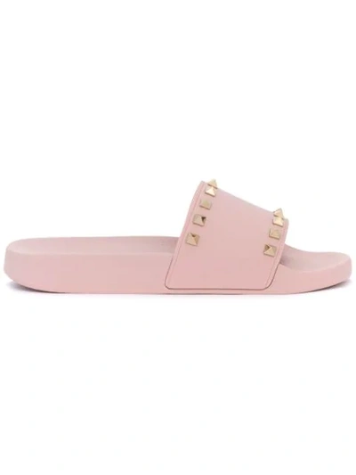 Shop Valentino Garavani Rockstud Slides In Pink