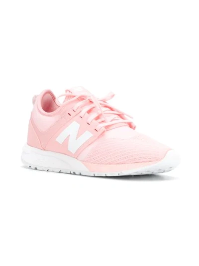 Shop New Balance 247 Low Top Trainers - Pink
