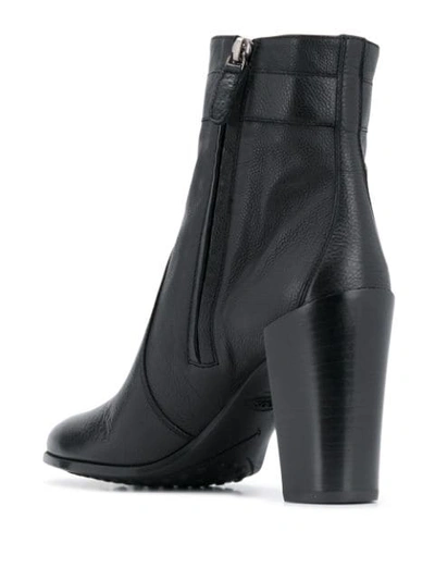 Shop Tod's Fringed Buckle Ankle Boots In Black