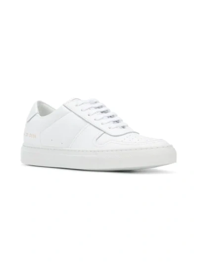 Shop Common Projects Bball Low Sneakers In White