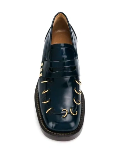 Shop Marni Pierced Thick Sole Loafers In 00b99