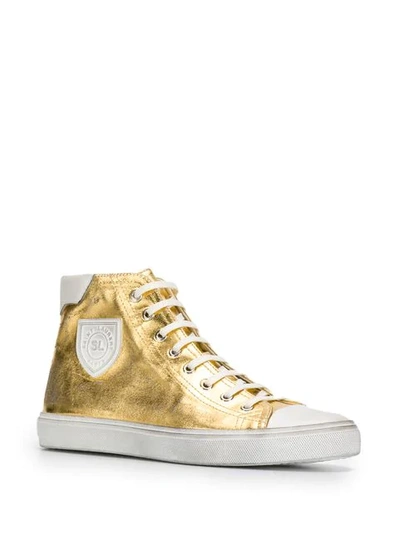 Shop Saint Laurent Bedford Metallic Sneakers In Gold