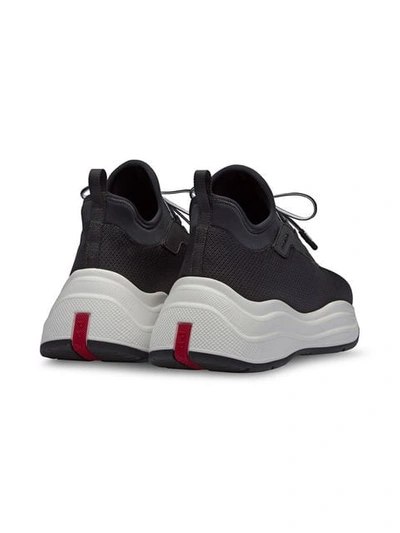 Shop Prada Mesh Sneakers In Black