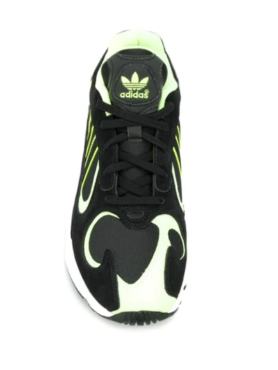 Shop Adidas Originals Yung-1 Sneakers In Black