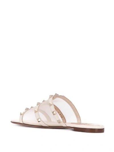 Shop Valentino Garavani Rockstud Slide Sandals In Neutrals