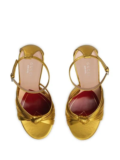Shop Gucci Metallic 105mm Sandals In Gold