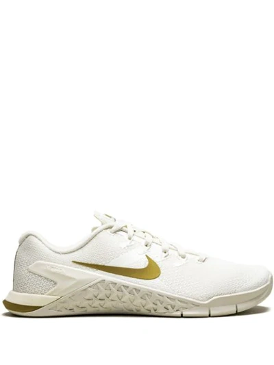 Shop Nike Wmns  Metcon 4 Chmp Sneakers - Neutrals